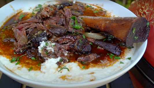 Braised Beef Shank over Cheese Grits