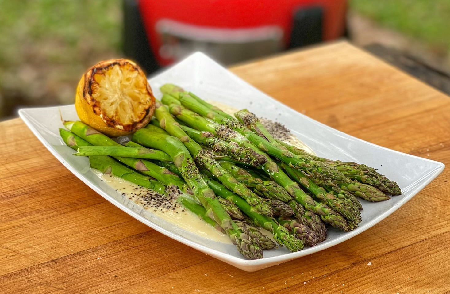 14 of the Best Kamado Joe Recipes Grilled Asparagus with Charred Lemon Butter Sauce