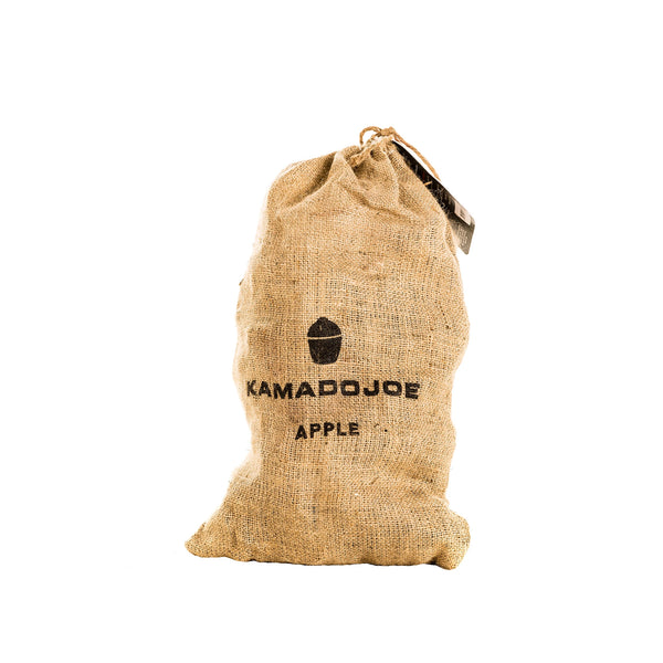 Burlap bag, tied closed at the top, with the Kamado Joe logo and the text "Kamado Joe Apple" stamped on it.