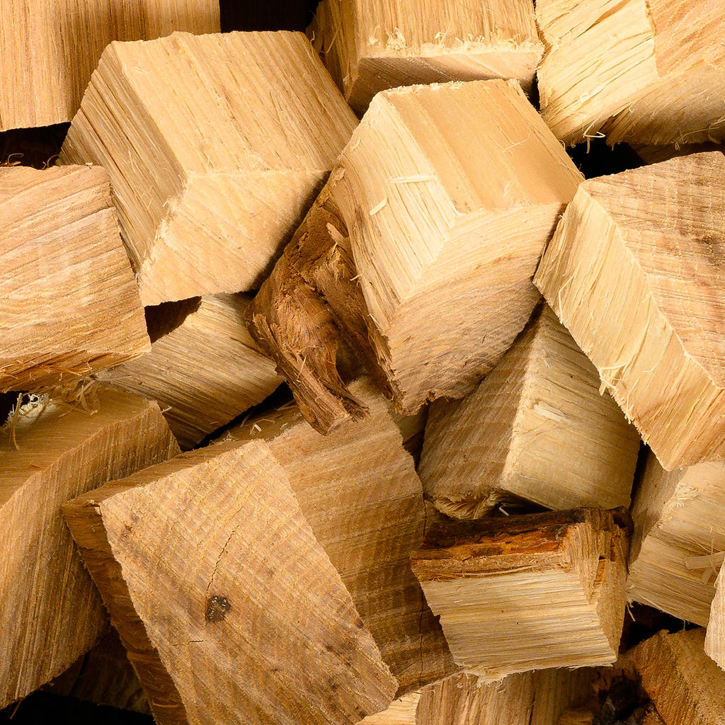 Close-up of wood chunks showing rough edges and irregular size.