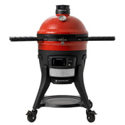 Konnected Joe grill front. The Kontrol Tower top vent, built-in dome temperature gauge, digital Kontrol Board, slide-out ash drawer, side shelves, and cart with casters and shelf are all visible.
