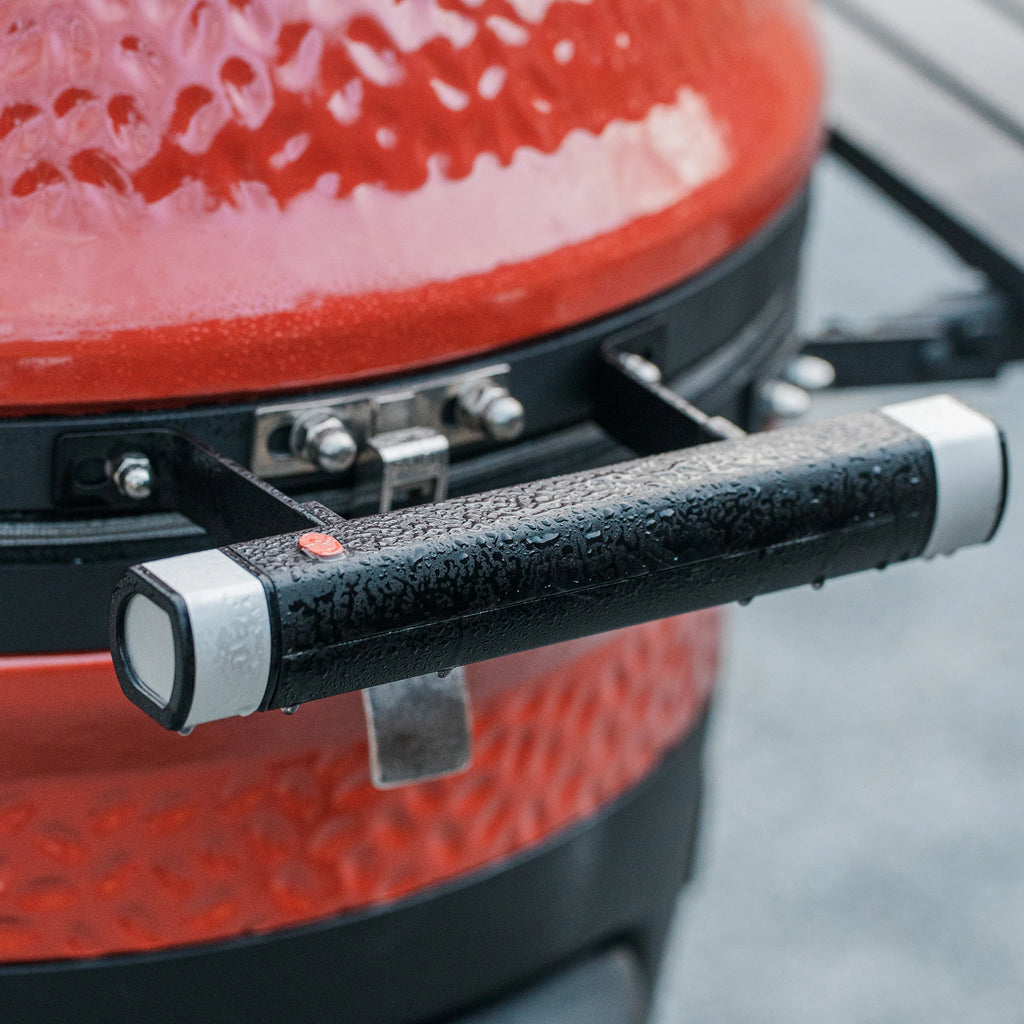 Close-up of the handle in the rain, showing the weather-resistant construction