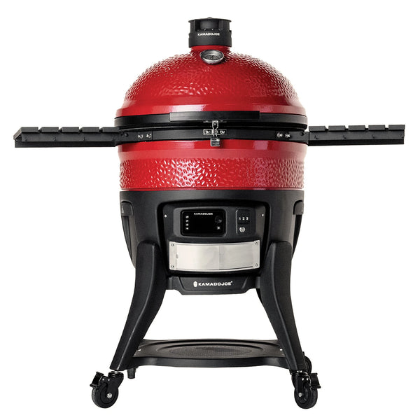 A closed Big Joe Konnected Joe Digital Charcoal Grill. The Kontrol Board is above the slide out ash drawer in the center-front of the grill base. The Kontrol Tower top vent and built-in temperature gauge can be seen at the top of the dome. 