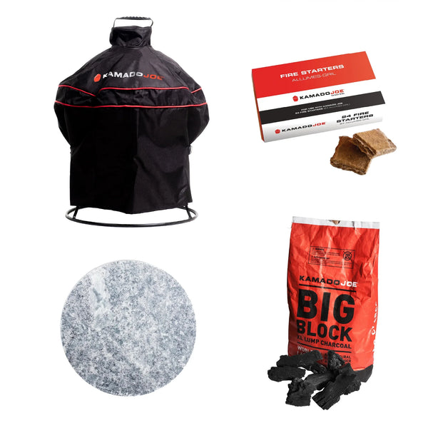 Kamado Joe Joe Jr accessories bundle including a black grill cover with red trim, a box of fire starters, a round soapstone cooking surface, and a bag of Kamado Joe Big Block XL Lump Charcoal on a white background.