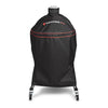 Black Kamado Joe grill cover with red accent piping and red and white brand logo, shown on a clean white background. Cover includes fitted sleeve for top vent and also covers the cart.