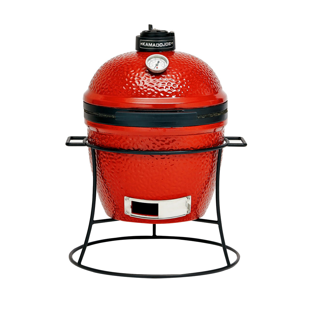 A red Joe Jr grill with black top vent and metal bands, stainless steel sliding ashtray access door, and built-in temperature gauge in the dome. The grill sits in a black cast iron stand formed from thick, round segments.  The stand has 2 built-in side handles for carrying the grill.