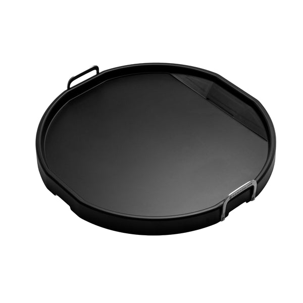Round griddle with 2 vertical loop handles and grease drain on one side away from the handles
