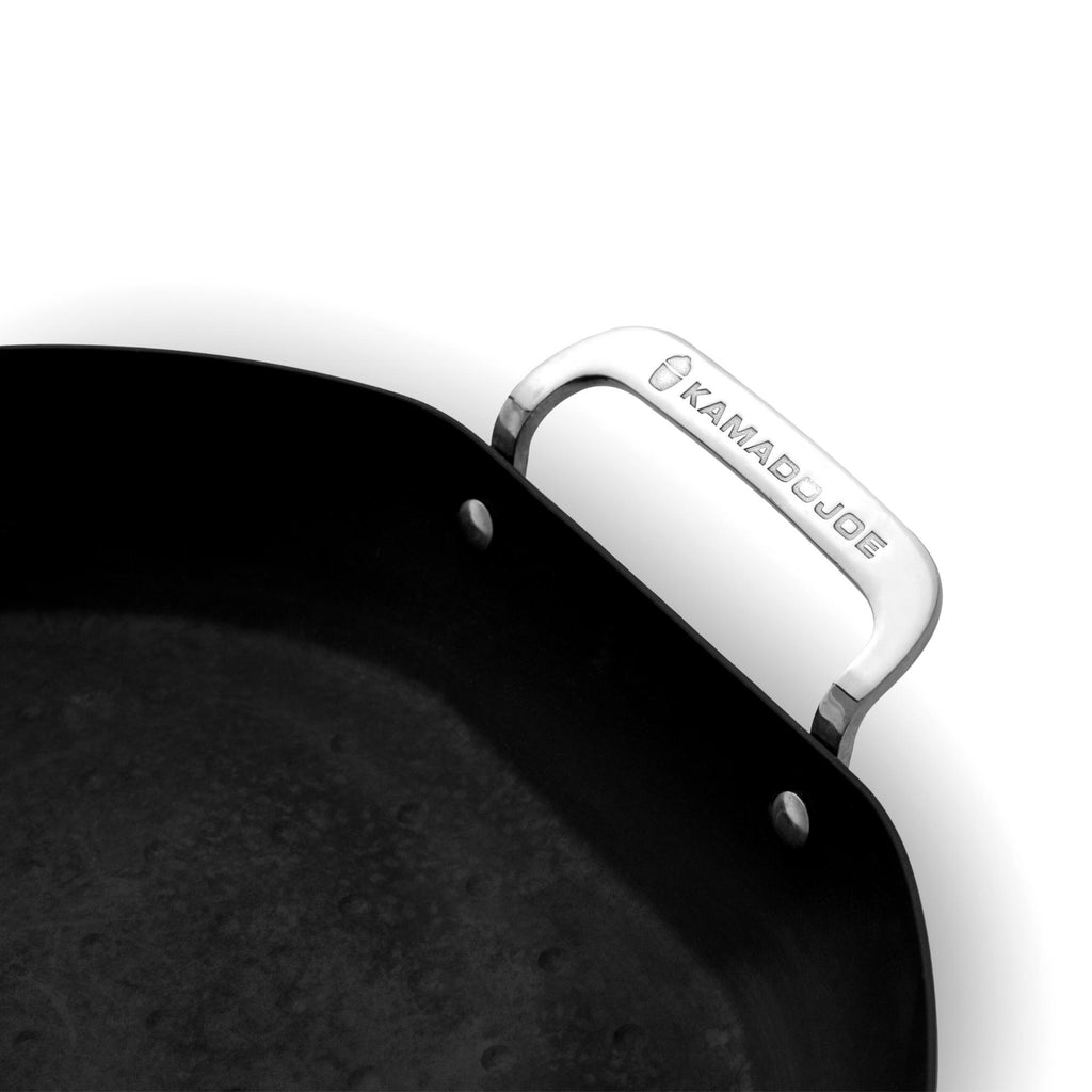 Curved stainless steel handle is engraved with Kamado Joe name and logo