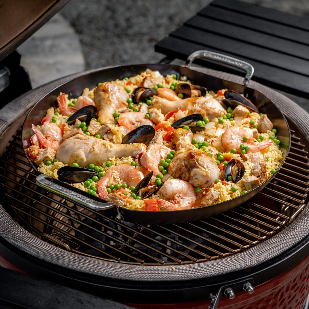 Paella Pan Vs Wok: Essential Cookware Showdown