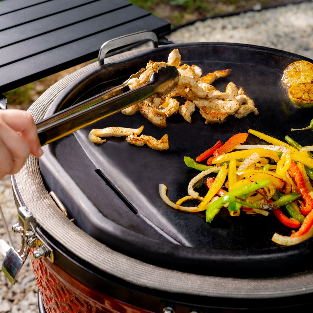 Using the flat-top griddle to make chicken fajitas