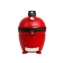Red Classic Joe II sitting on red ceramic feet. Grill has black Kontrol Tower top vent and metal bands. There is a built-in temperature gauge in the dome and a stainless steel sliding door in the base.